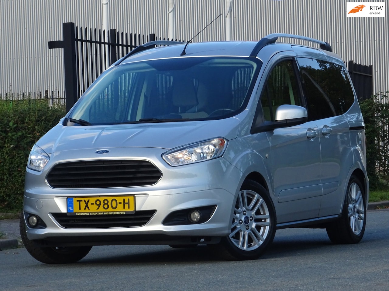 Ford Tourneo Courier - 1.0 Titanium 1-EIGENAAR CLIMA/CRUISE - AutoWereld.nl