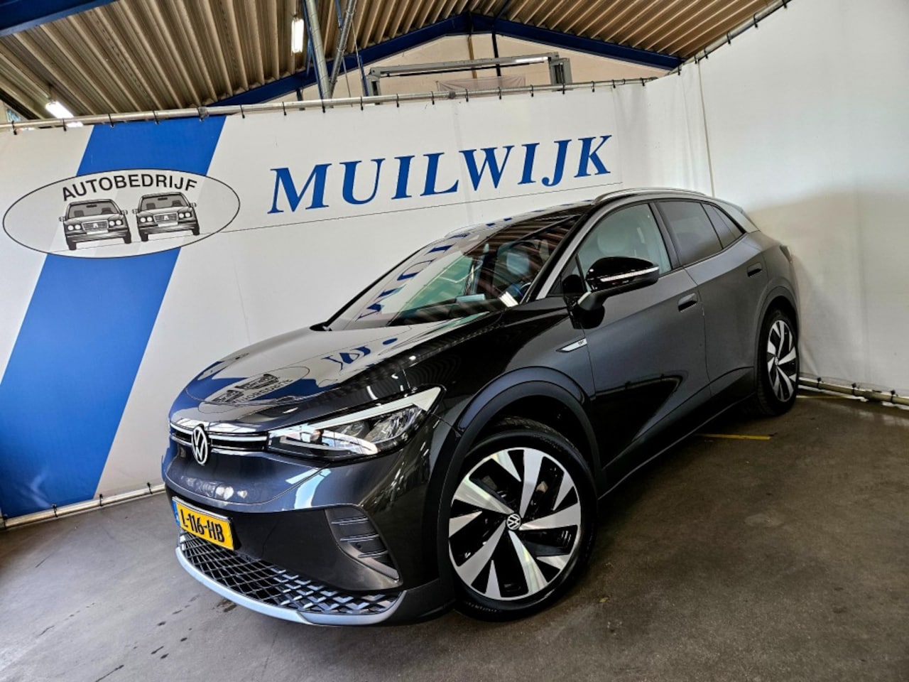 Volkswagen ID.4 - First 77 kWh / Warmtepomp / Camera / CarPlay / NL Auto - AutoWereld.nl