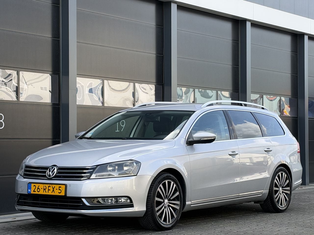 Volkswagen Passat Variant - 1.6 TDI Highline Leer Navi Clima PDC - AutoWereld.nl