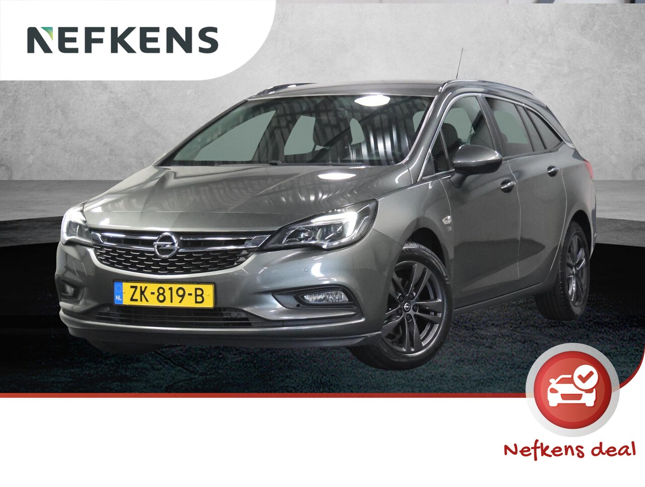 Opel Astra Sports Tourer - ST 105PK 120 Jaar Edition | 1ste eigenaar | Camera | Trekhaak | AppleCarPlay/Android | Arm - AutoWereld.nl