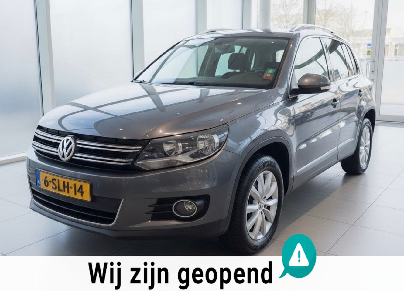 Volkswagen Tiguan - 1.4 TSI Sport&Style automaat pano - AutoWereld.nl