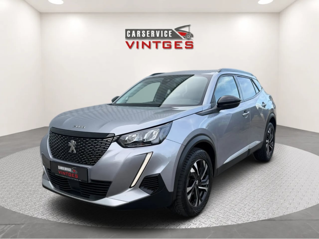 Peugeot 2008 - 1.2 PureTech Allure 130 pk AUTOMAAT | Camera | Navi | CarPlay | PDC V+A | Keyless - AutoWereld.nl