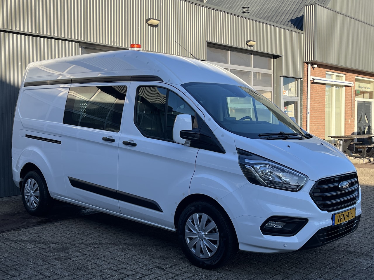 Ford Transit Custom - 340 2.0 TDCI L2H2 airco Cruise controle Trekhaak 2800kg trekgewicht Werkverlichting Stand - AutoWereld.nl