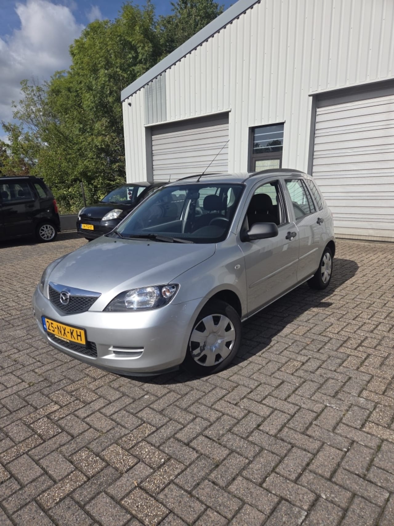 Mazda 2 - 1.4 Exclusive Airco | 5 DRS | multifunc stuur | lage KM stand | APK - AutoWereld.nl