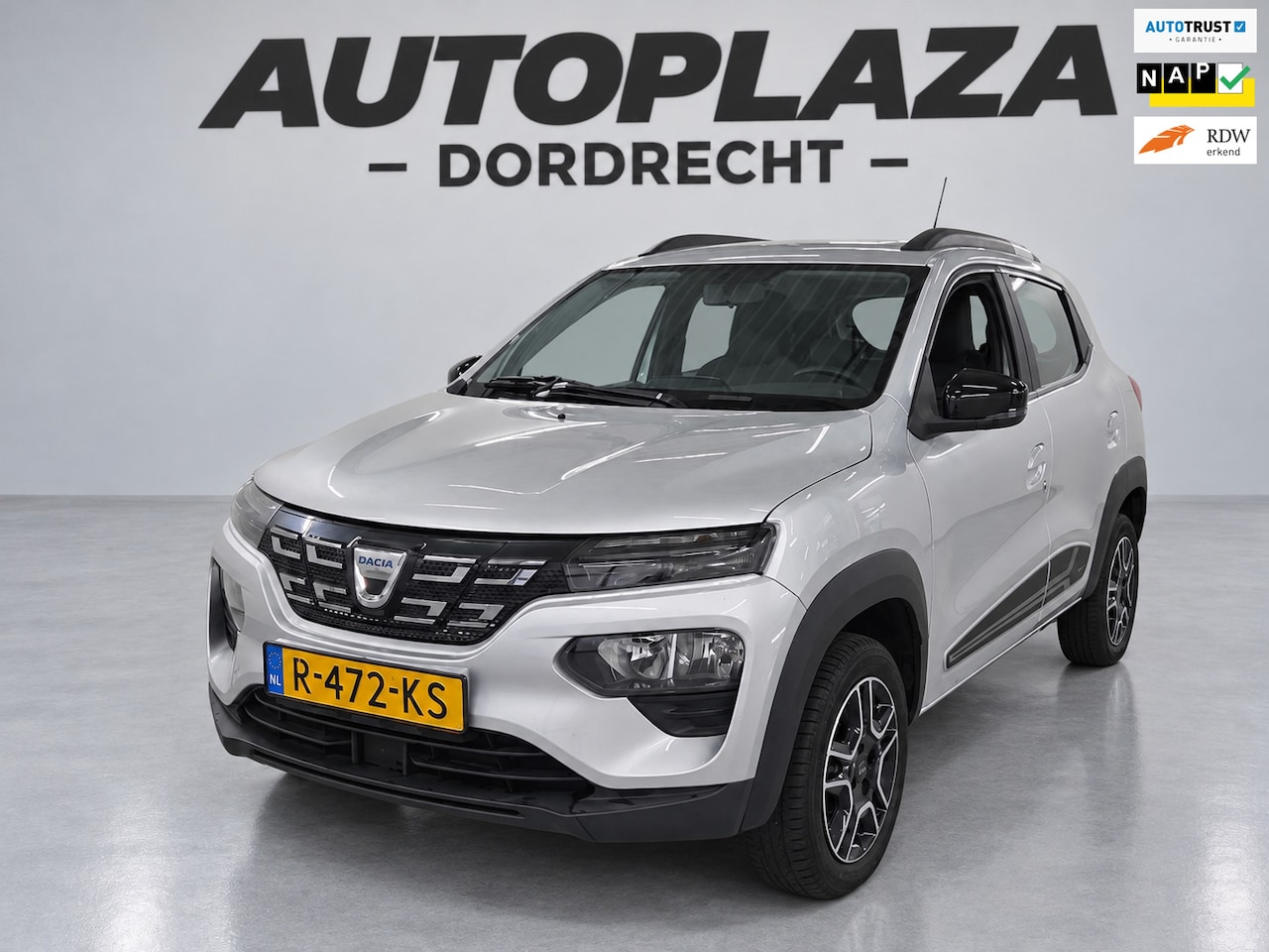 Dacia Spring - Comfort Plus (Orange Pack) 27 kWh- SOH 89% - achteruitrijcamera - parkeersensoren voor en - AutoWereld.nl