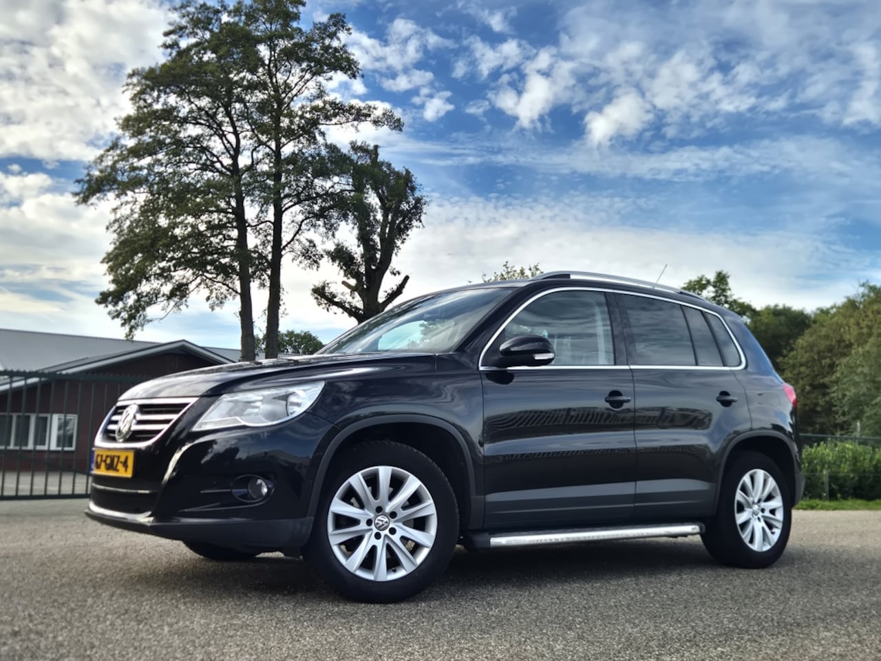 Volkswagen Tiguan - 2.0 TSI Sport&St.4M - AutoWereld.nl