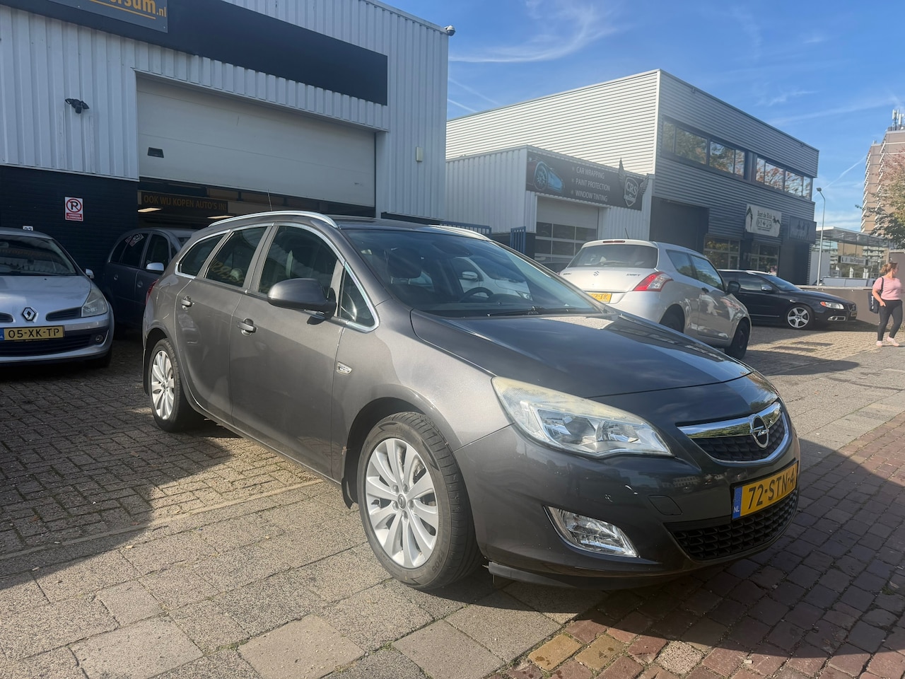 Opel Astra Sports Tourer - 1.4 Turbo Cosmo 1.4 Turbo Cosmo - AutoWereld.nl