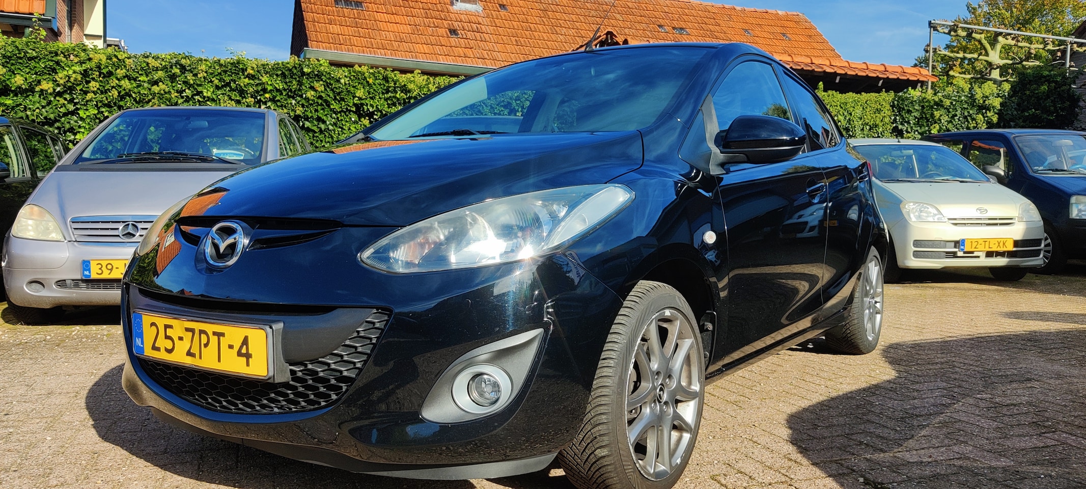Mazda 2 - 1.3 BIFUEL GT LPG vanaf fabriek, eerste eigenaar, Airco, stoelverwarming - AutoWereld.nl