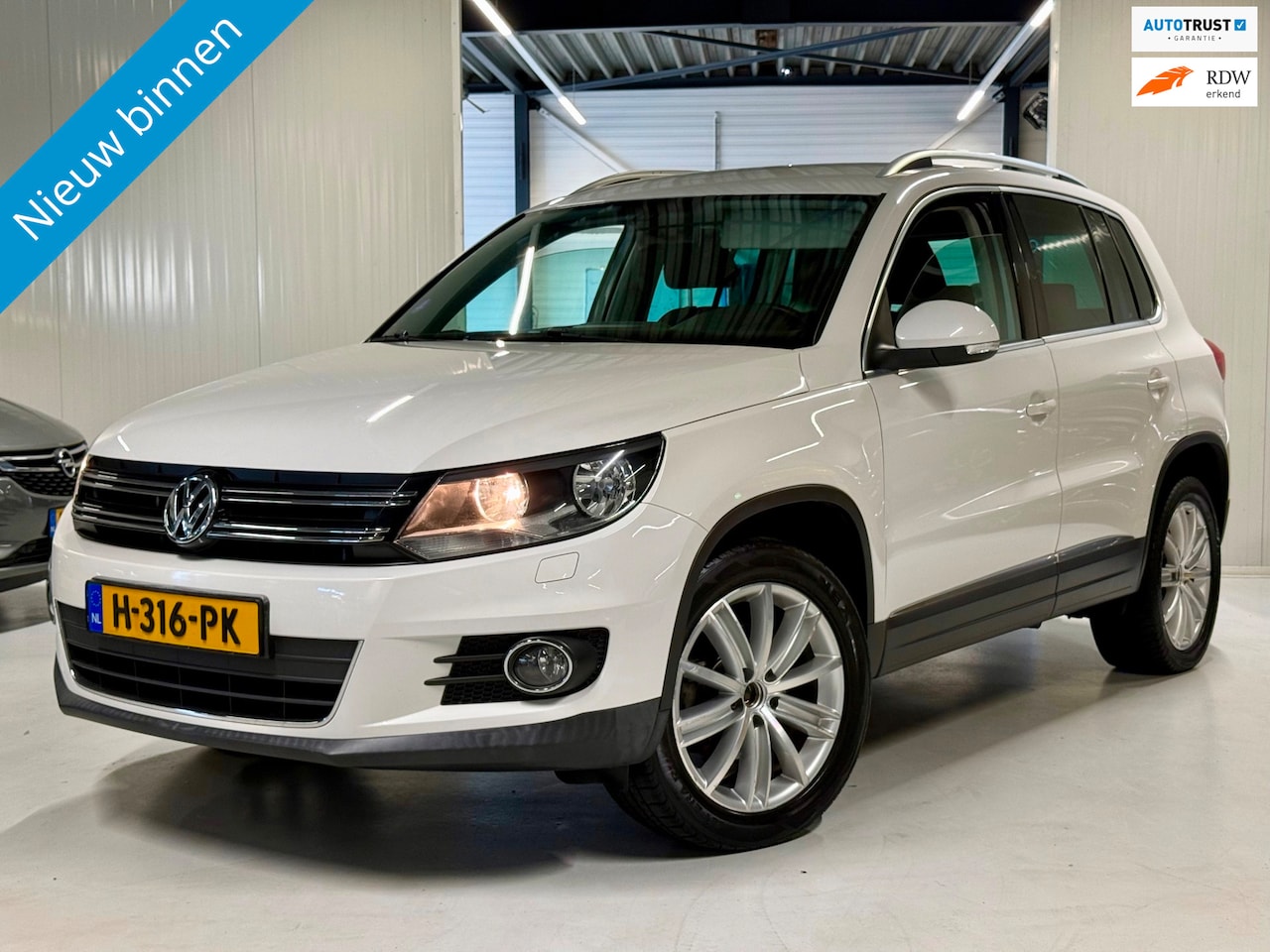 Volkswagen Tiguan - 1.4 TSI 150PK Sport&Style Carplay|Trekhaak! - AutoWereld.nl