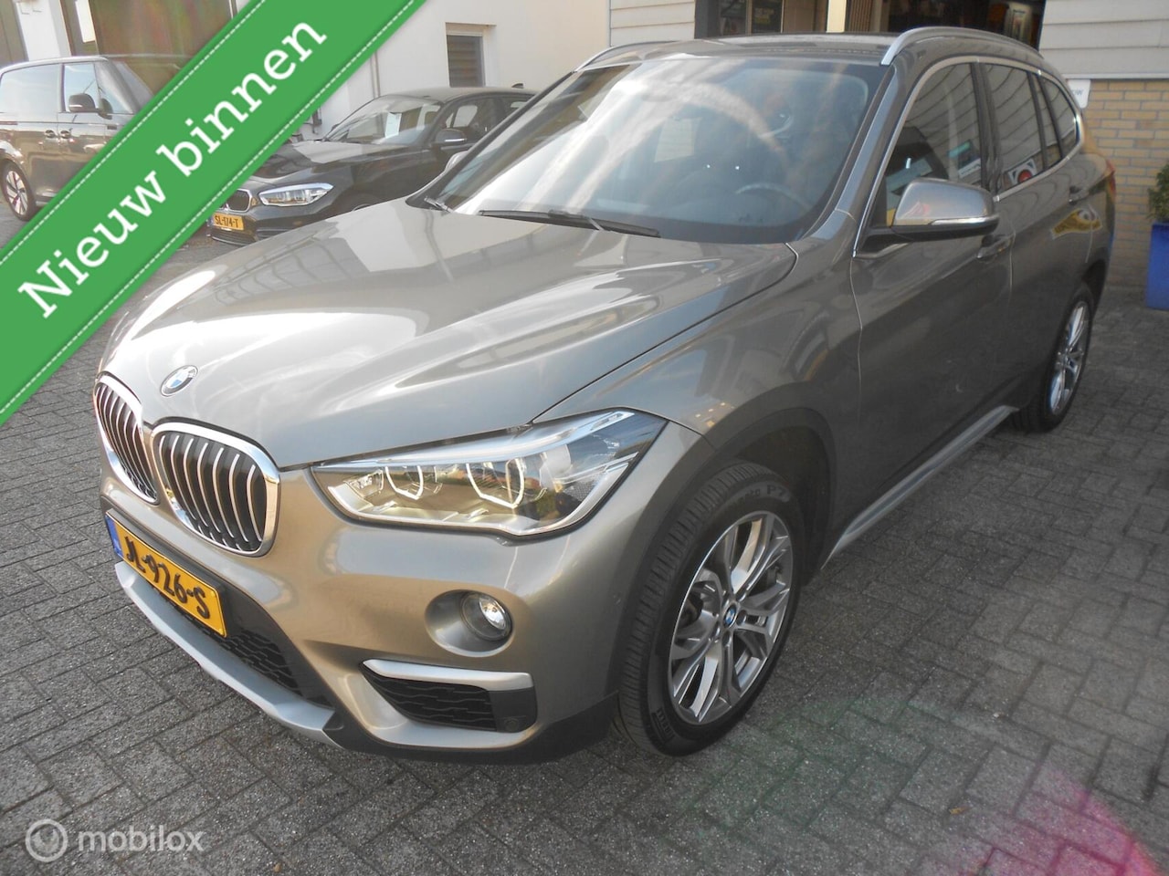 BMW X1 - xDrive20i Centennial High Executive head- up display leer - AutoWereld.nl