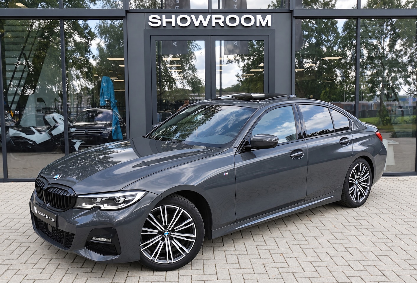 BMW 3-serie - 320i High Executive PANO H&K LEDER - AutoWereld.nl