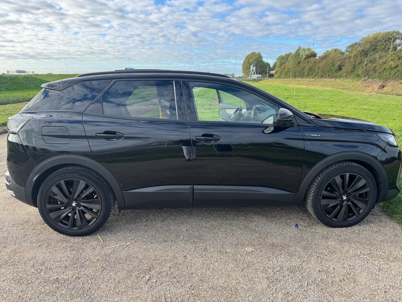 Peugeot 3008 - 1.6 HYbrid4 300 GT Pack Business Stoelmassage | Black pack | Stoelverwarming | Camera / Navigatie / Focal - AutoWereld.nl