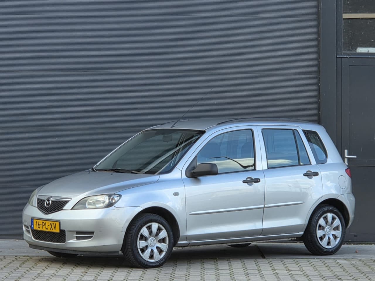 Mazda 2 - 1.4 Exclusive | NAP | AIRCO | NWE APK 2027! - AutoWereld.nl