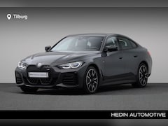 BMW i4 - M50 High Executive 84 kWh | Laserlight | Comfort Access | Elektrisch verstelbare en verwar