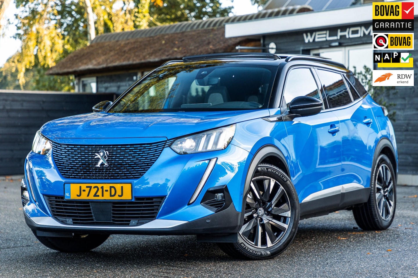 Peugeot e-2008 - EV Allure 50 kWh I 85% SOH I Pano I Carplay I super netjes I Geurvrij I - AutoWereld.nl