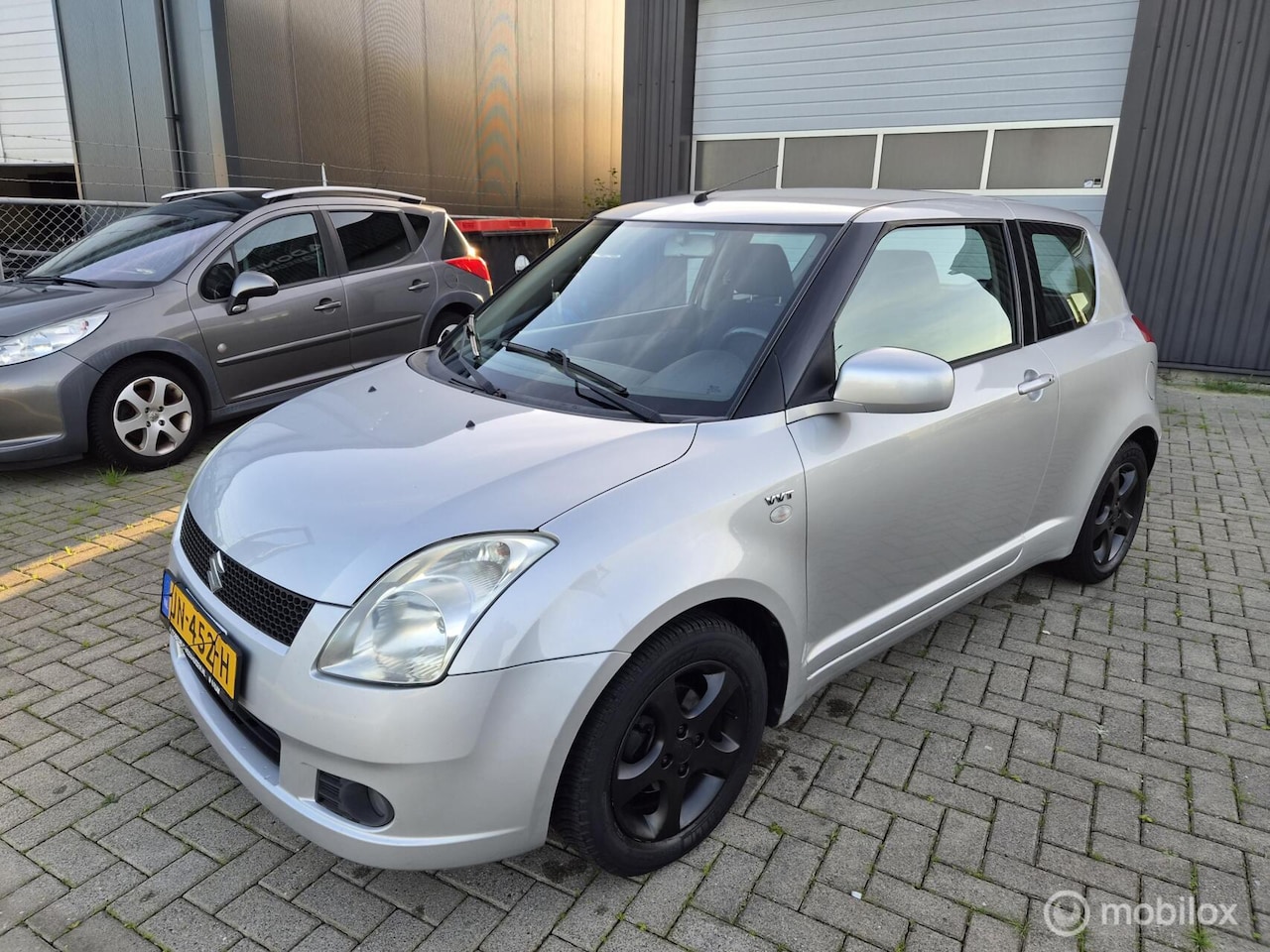 Suzuki Swift - 1.5 GLS AIRCO/Stoelverwarming APK 10/2027 - AutoWereld.nl