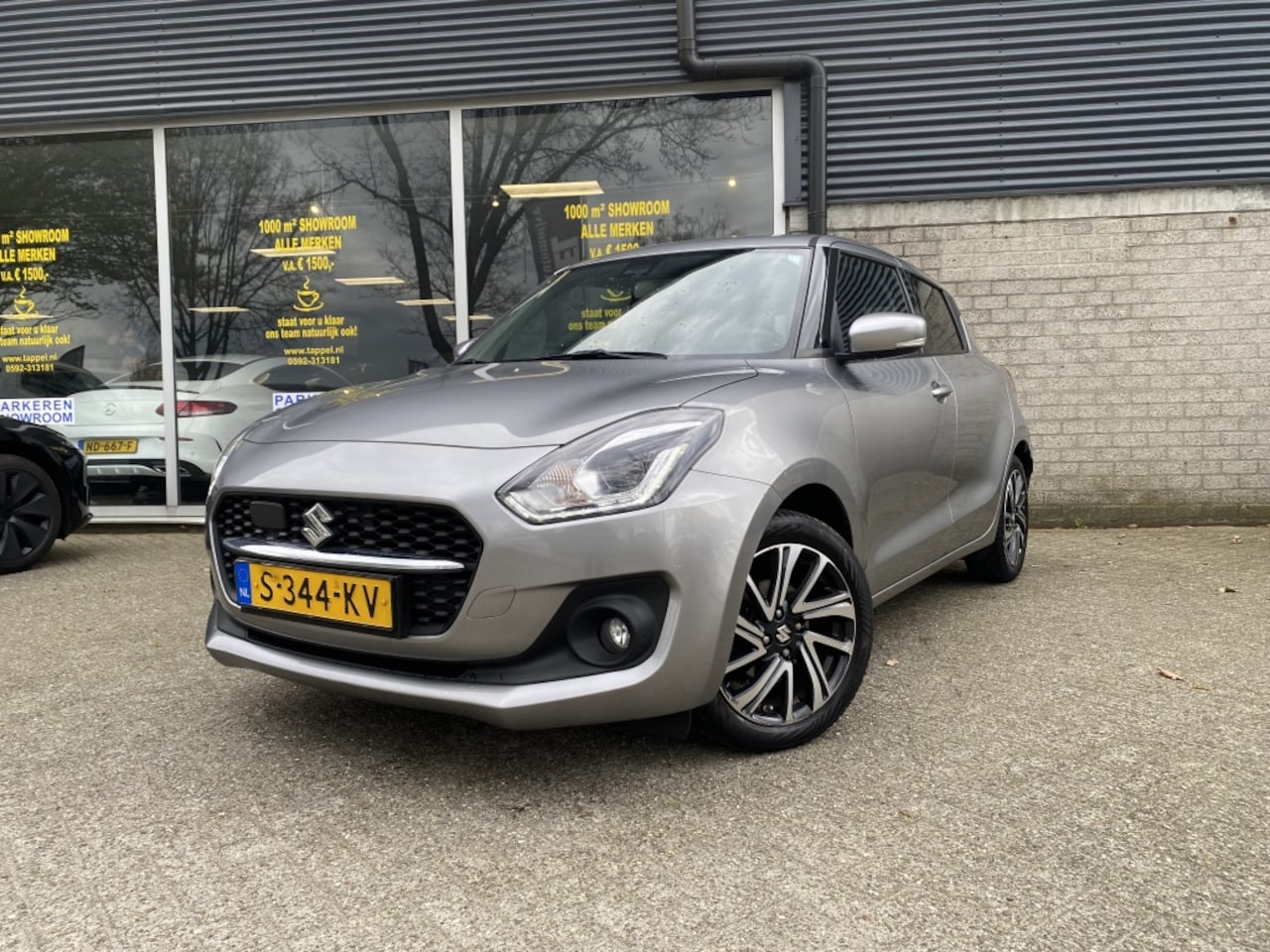 Suzuki Swift - 1.2 Style Smart Hybrid L.M./Carplay/stoelverwarming - AutoWereld.nl