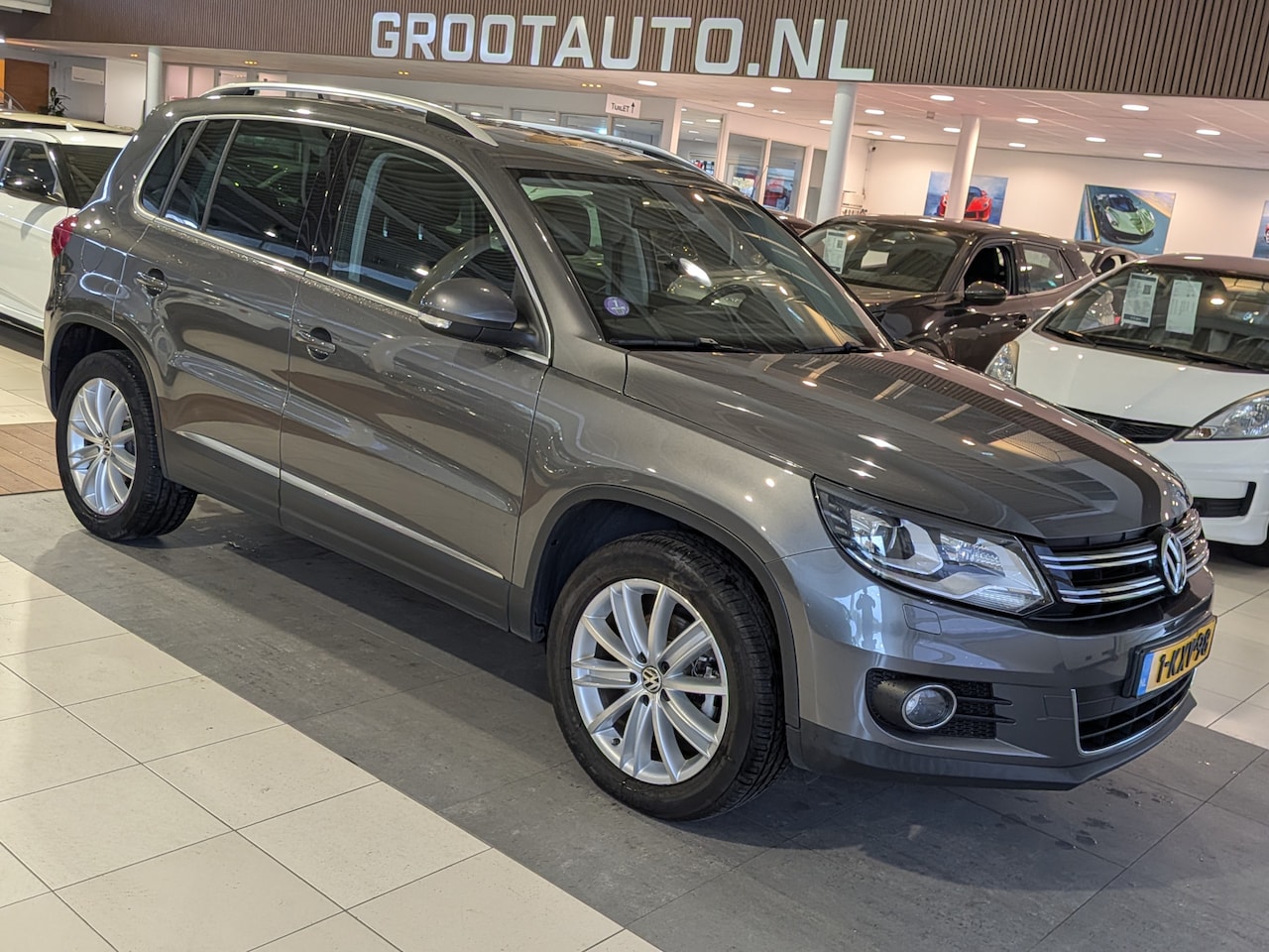Volkswagen Tiguan - 2.0 TSI Sport&Style 4Motion Trekhaak, Tiptronic, Cruise Control - AutoWereld.nl