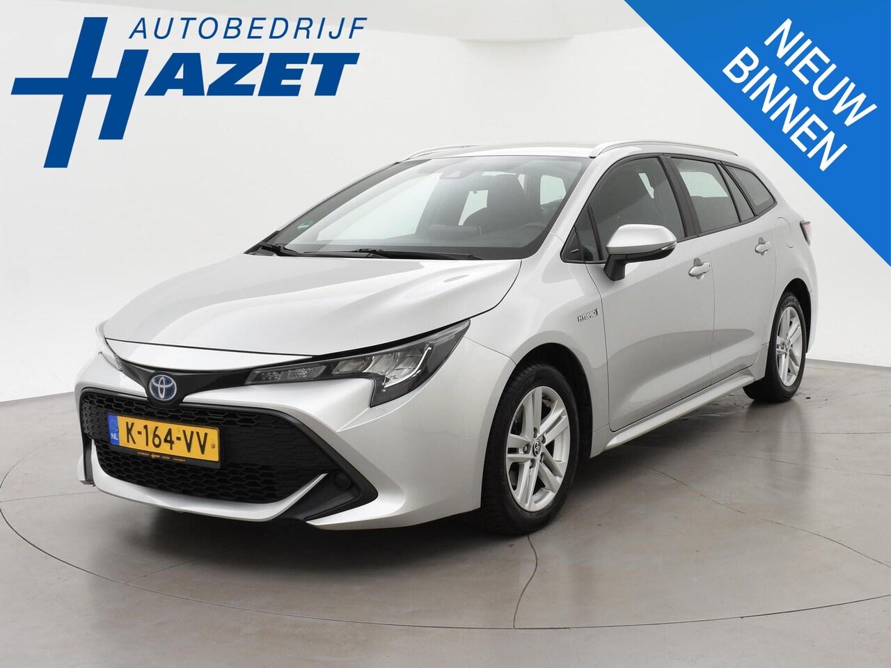Toyota Corolla Touring Sports - 1.8 HYBRID AUT. ACTIVE + ADAPTIVE CRUISE | CAMERA | NAVIGATIE | DAB - AutoWereld.nl