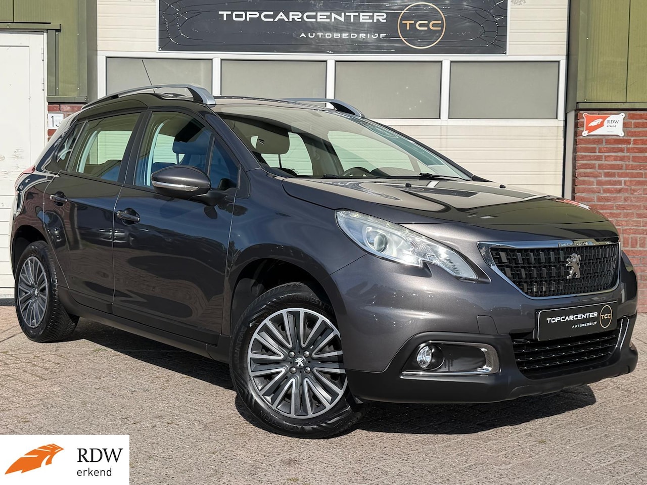 Peugeot 2008 - 1.2 Allure/AIRCO/NAVI/CRUISE/TREKH/APK/NAP - AutoWereld.nl