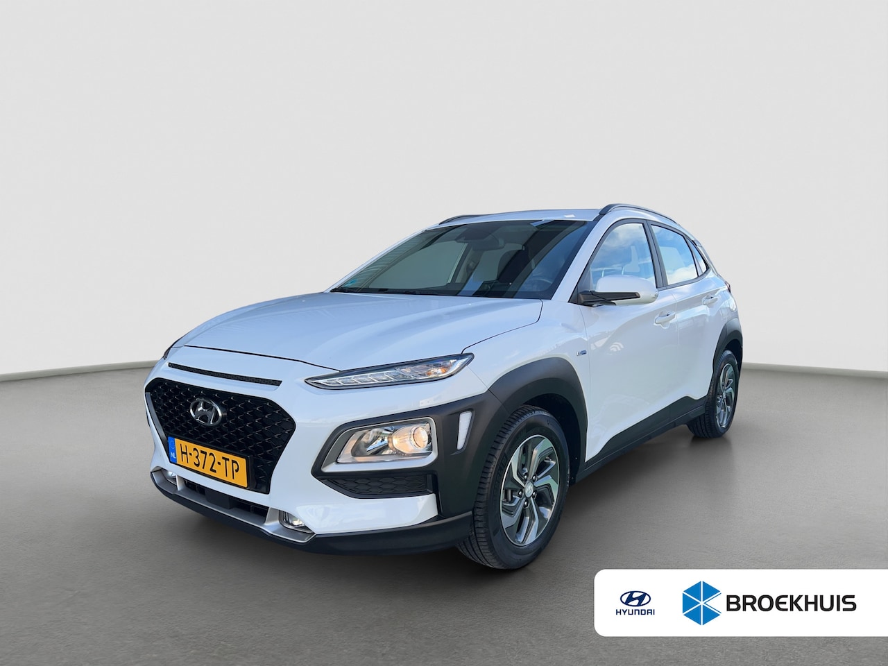 Hyundai Kona - 1.6 GDI 141pk HEV Comfort | Trekhaak | Camera | Carplay | Parkeersensoren | Climate contro - AutoWereld.nl