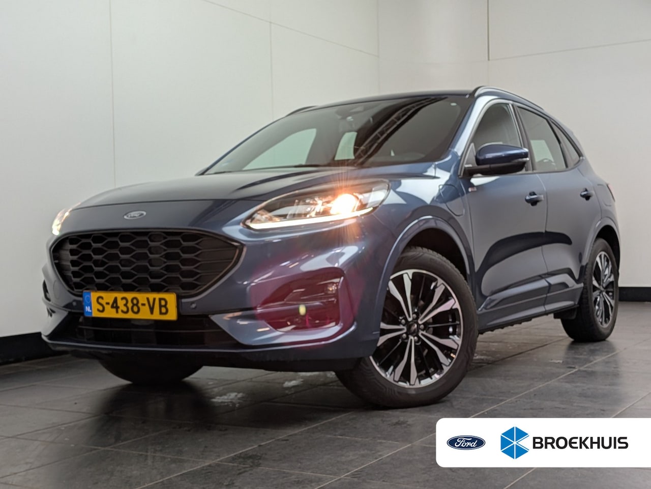 Ford Kuga - 2.5 PHEV ST-Line | 1e Eigenaar! | Dealer Onderhouden! | Trekhaak | Winterpack | Navi | Cam - AutoWereld.nl
