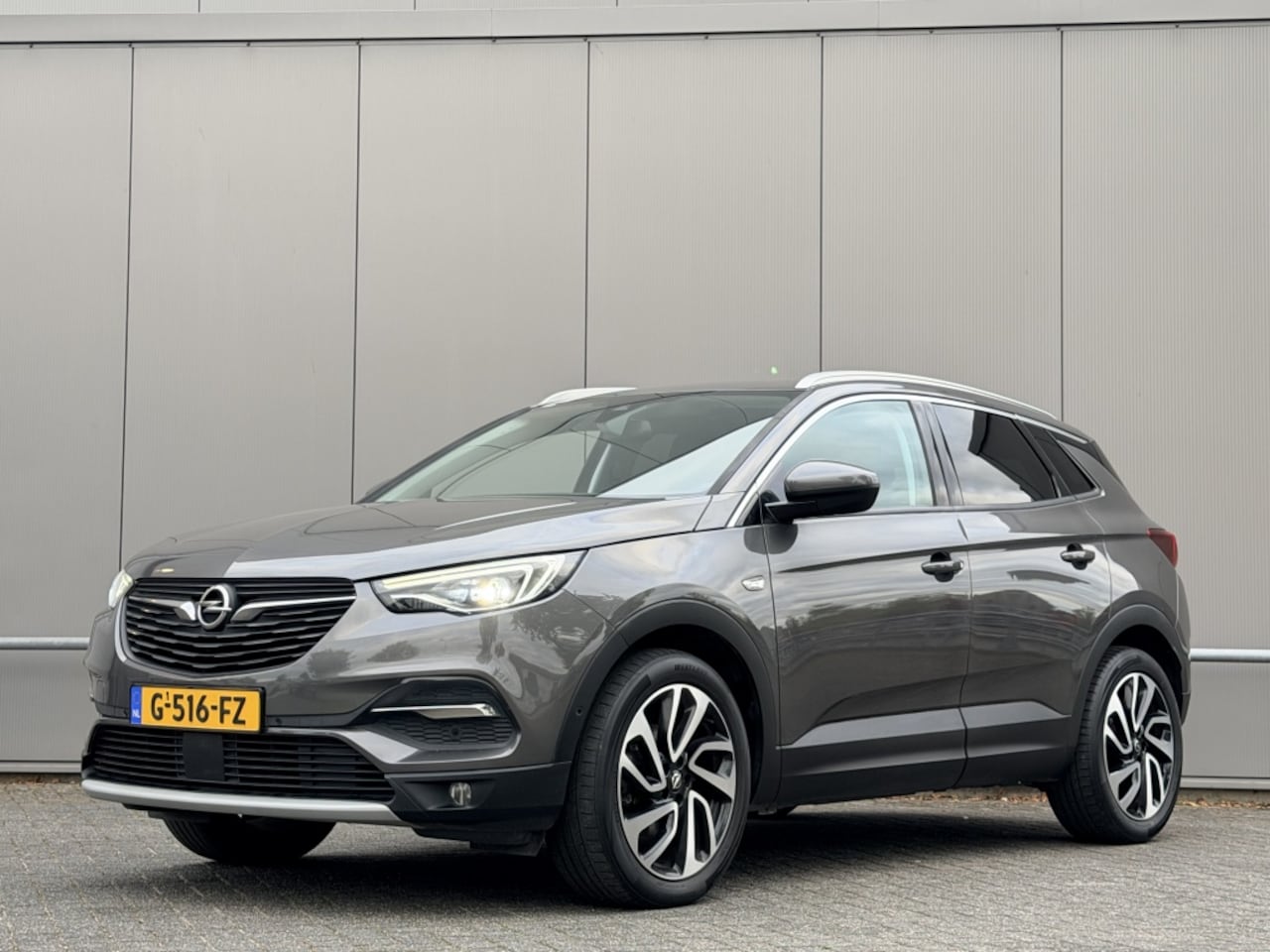 Opel Grandland X - 1.2 Turbo Bus. Ex. automaat - navi - airco - trekhaak - cruise - AutoWereld.nl