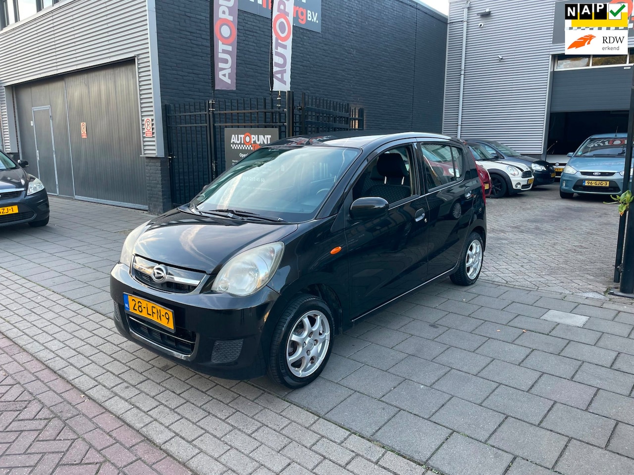 Daihatsu Cuore - 1.0 Trend Stuurbekrachtiging Subwoofer NAP APK - AutoWereld.nl
