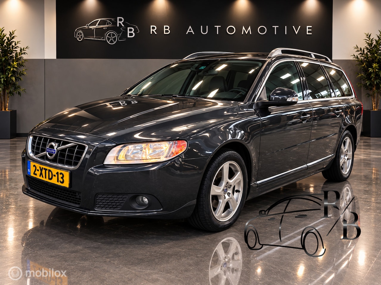 Volvo V70 - 2.0D Momentum ZEER NETTE AUTO LEER NAVI AC CRUISE - AutoWereld.nl