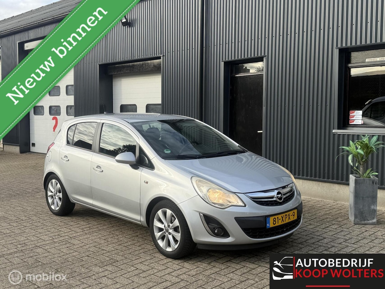 Opel Corsa - 1.4-16V Airco 5drs Navigatie - AutoWereld.nl
