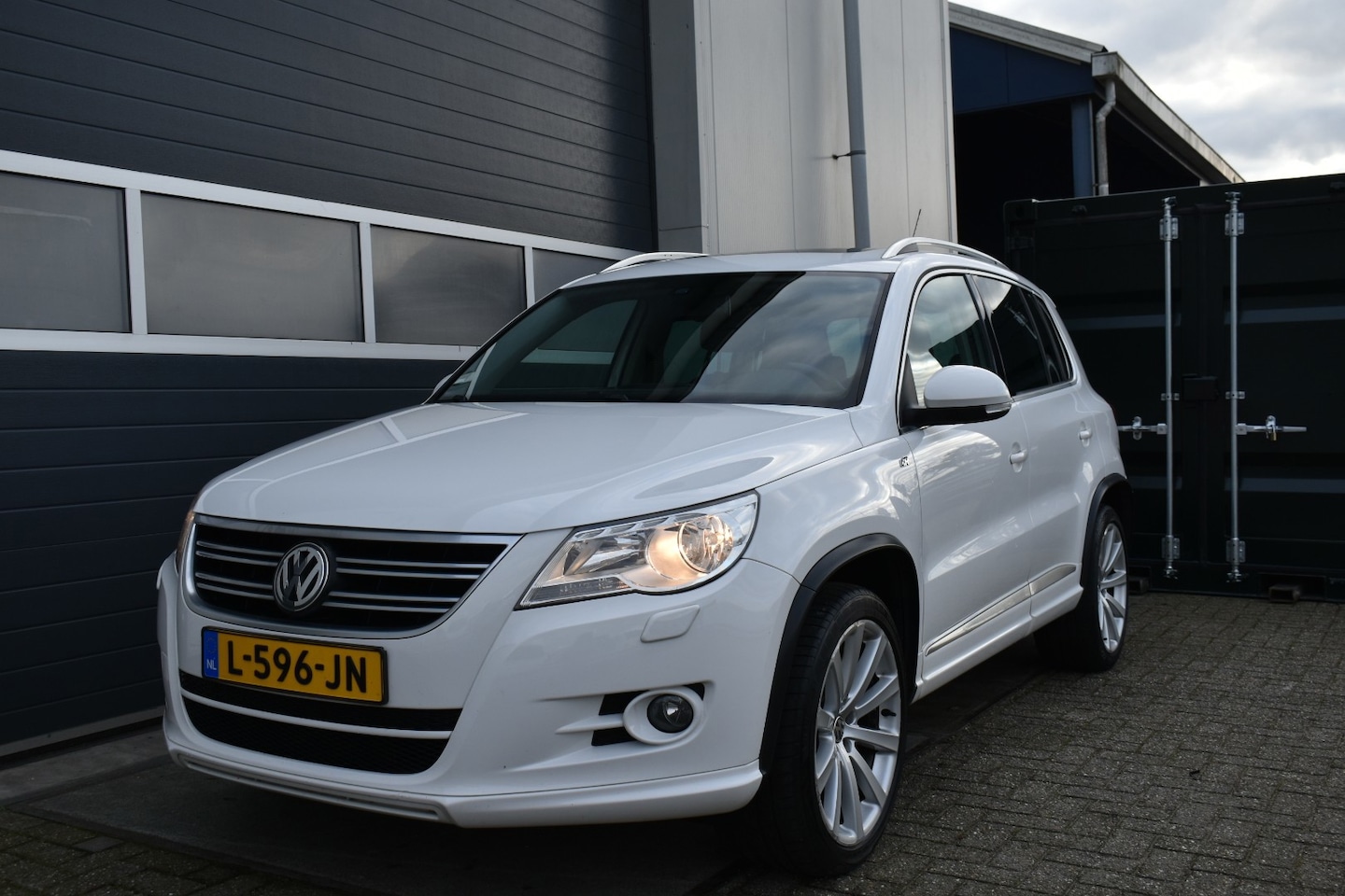Volkswagen Tiguan - 1.4 TSI Sport&Style 4Motion R-Line - AutoWereld.nl