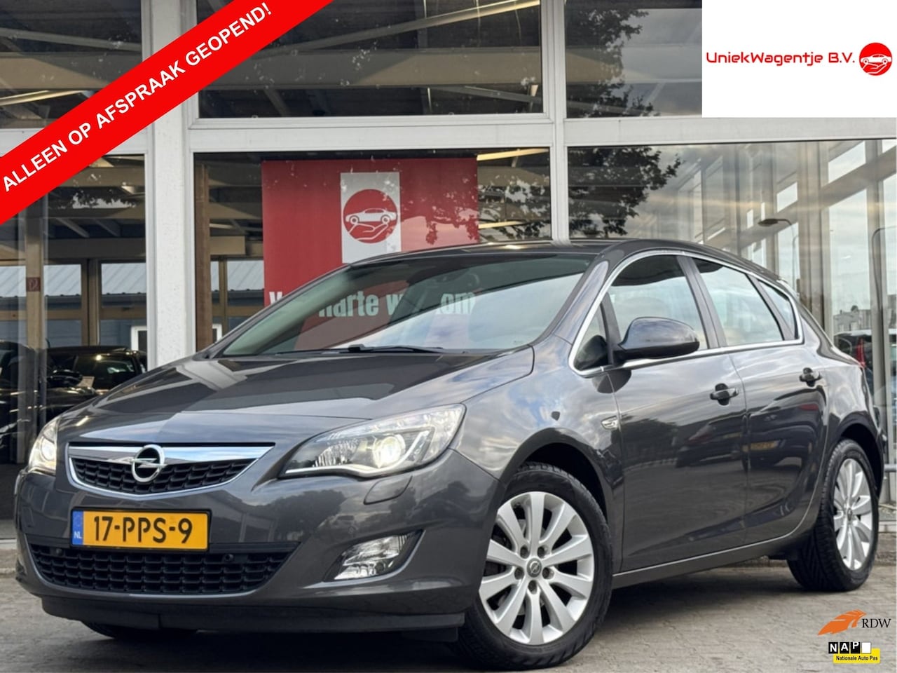 Opel Astra - 1.6 TURBO COSMO | NL-AUTO! | LEDER! | NAVI! - AutoWereld.nl