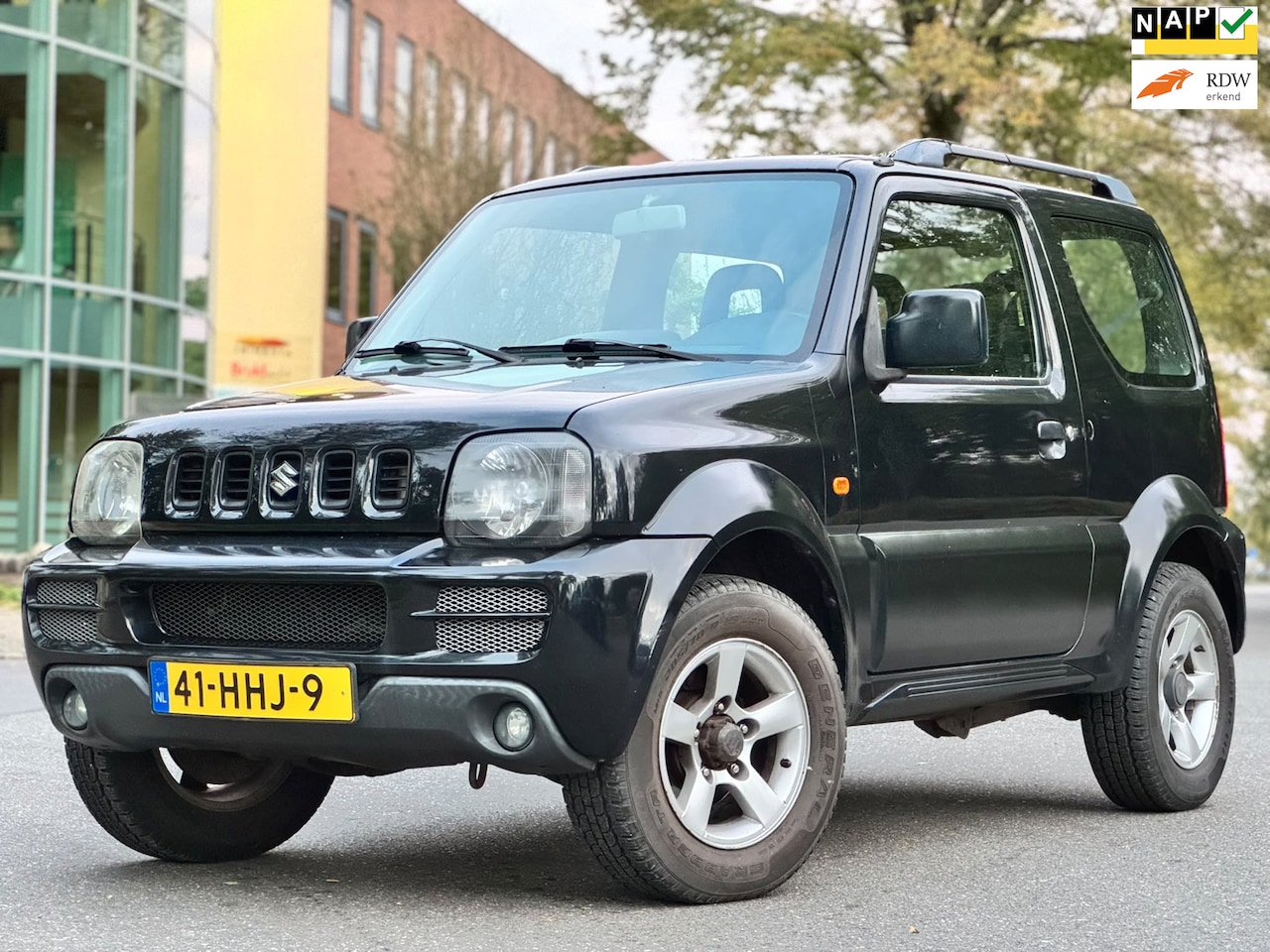 Suzuki Jimny - 1.3 Exclusive|4WD|AIRCO|CRUISE|ELEKRAMEN|NAP|BOEKJES - AutoWereld.nl