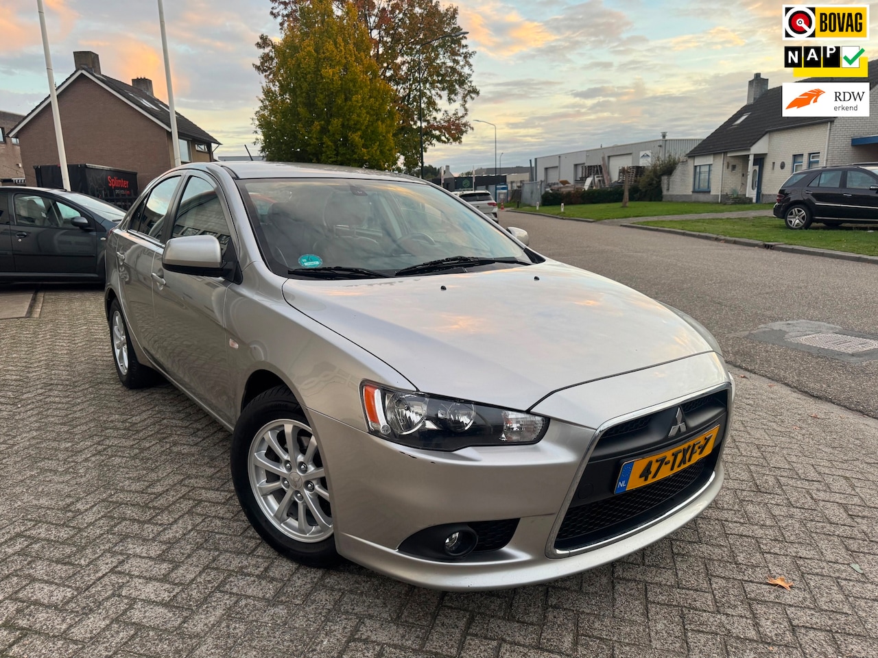 Mitsubishi Lancer Sportback - 1.6 Edition Two Airco,Leer, PDC - AutoWereld.nl