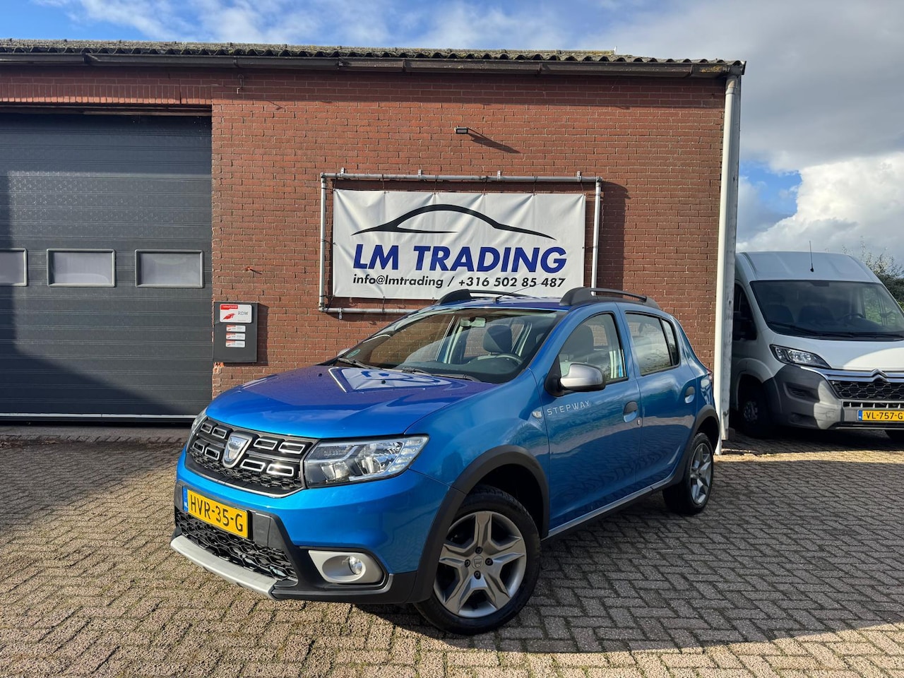 Dacia Sandero - 1.0 SCe Laureate AIRCO LED 2 SLEUTELS + BOEKJES! - AutoWereld.nl