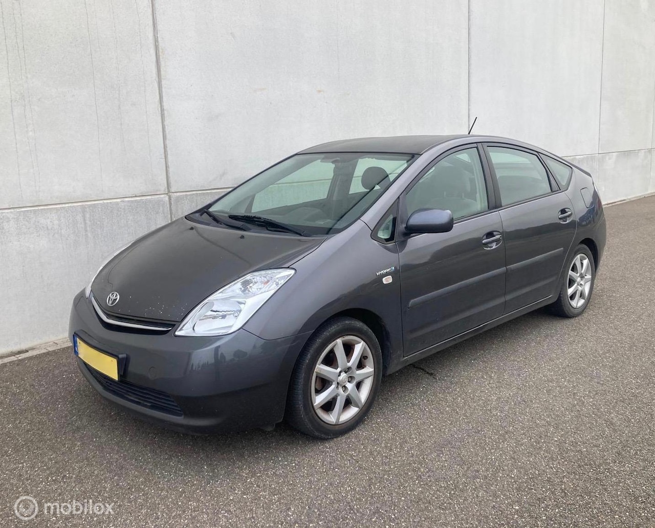 Toyota Prius - 1.5 VVT-i Comfort HYBRIDE AUTOMAAT 1e EIGENAAR - AutoWereld.nl