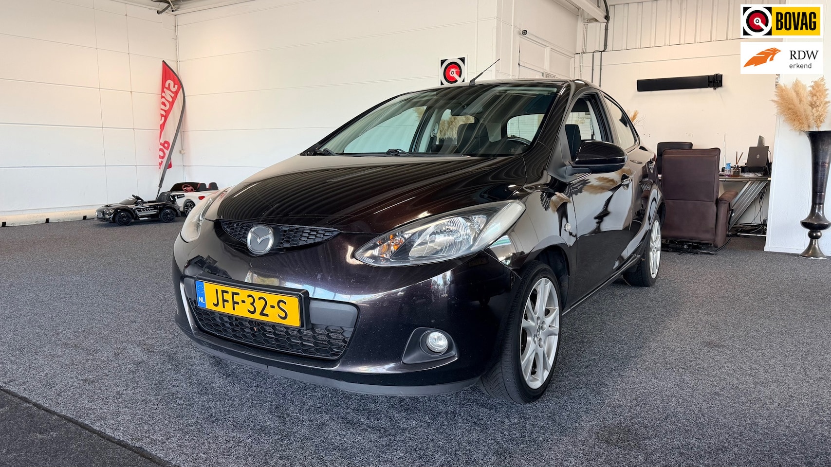 Mazda 2 - 1.3 S-VT Exclusive 1.3 S-VT Exclusive, Airco, Stoelverwarming, Carplay - AutoWereld.nl
