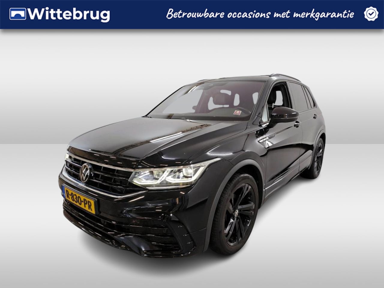 Volkswagen Tiguan - 1.5 TSI R-Line Business / AUTOMAAT/ PANO/ CRUISE/ PARK.SENSOREN V+A/ CAMERA/ DIGITAL DASH/ - AutoWereld.nl