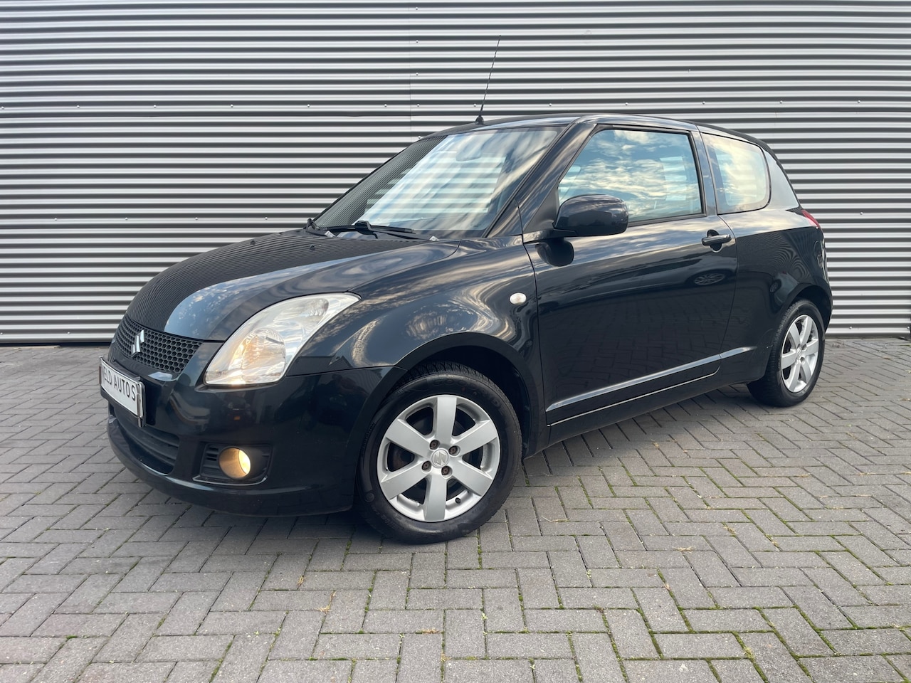 Suzuki Swift - 1.3 Bandit 2009 met airco / lmv / keyless go - AutoWereld.nl
