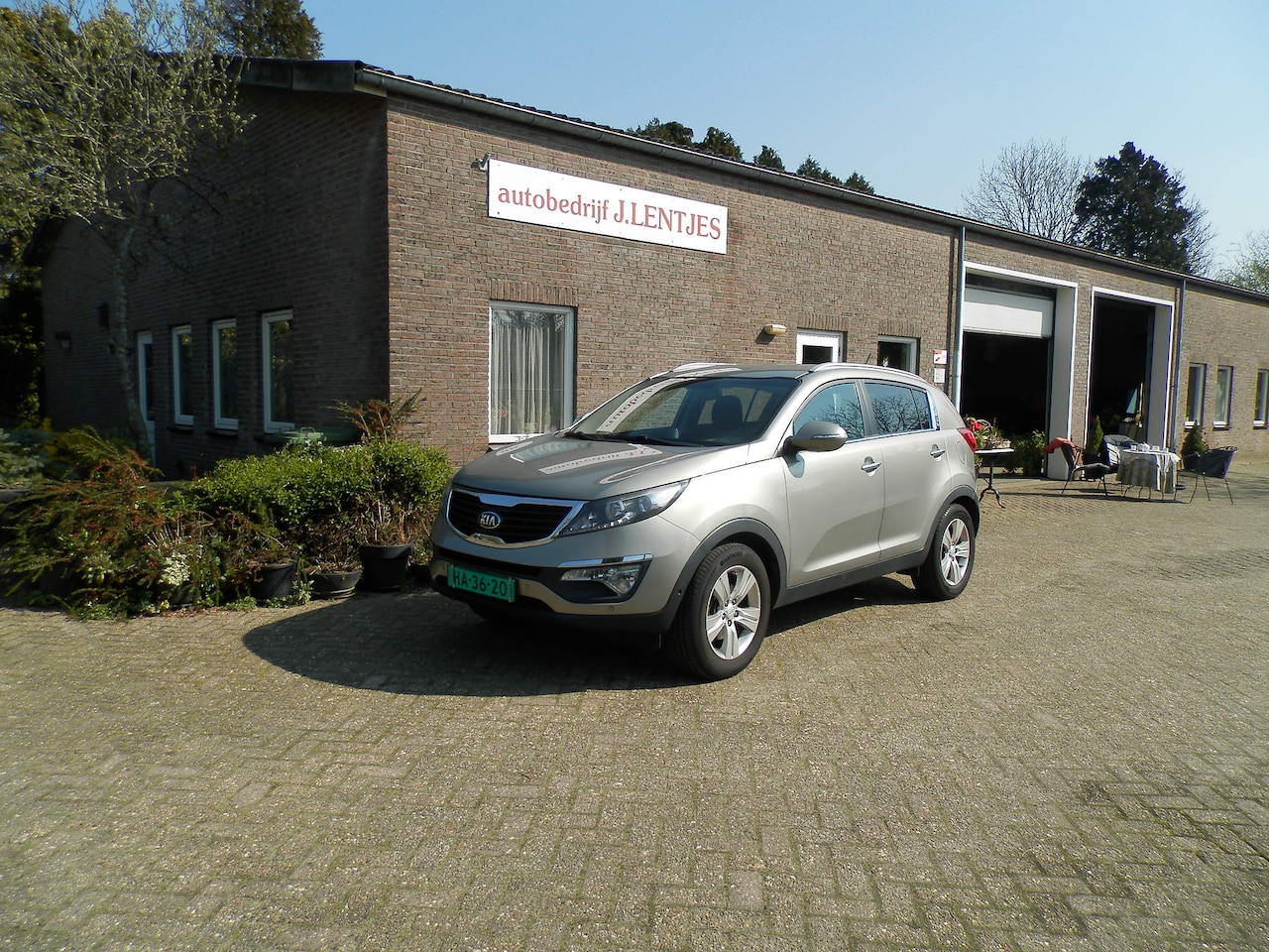 Kia Sportage - 1.6 GDI Plus Pack airco trekhaak - AutoWereld.nl
