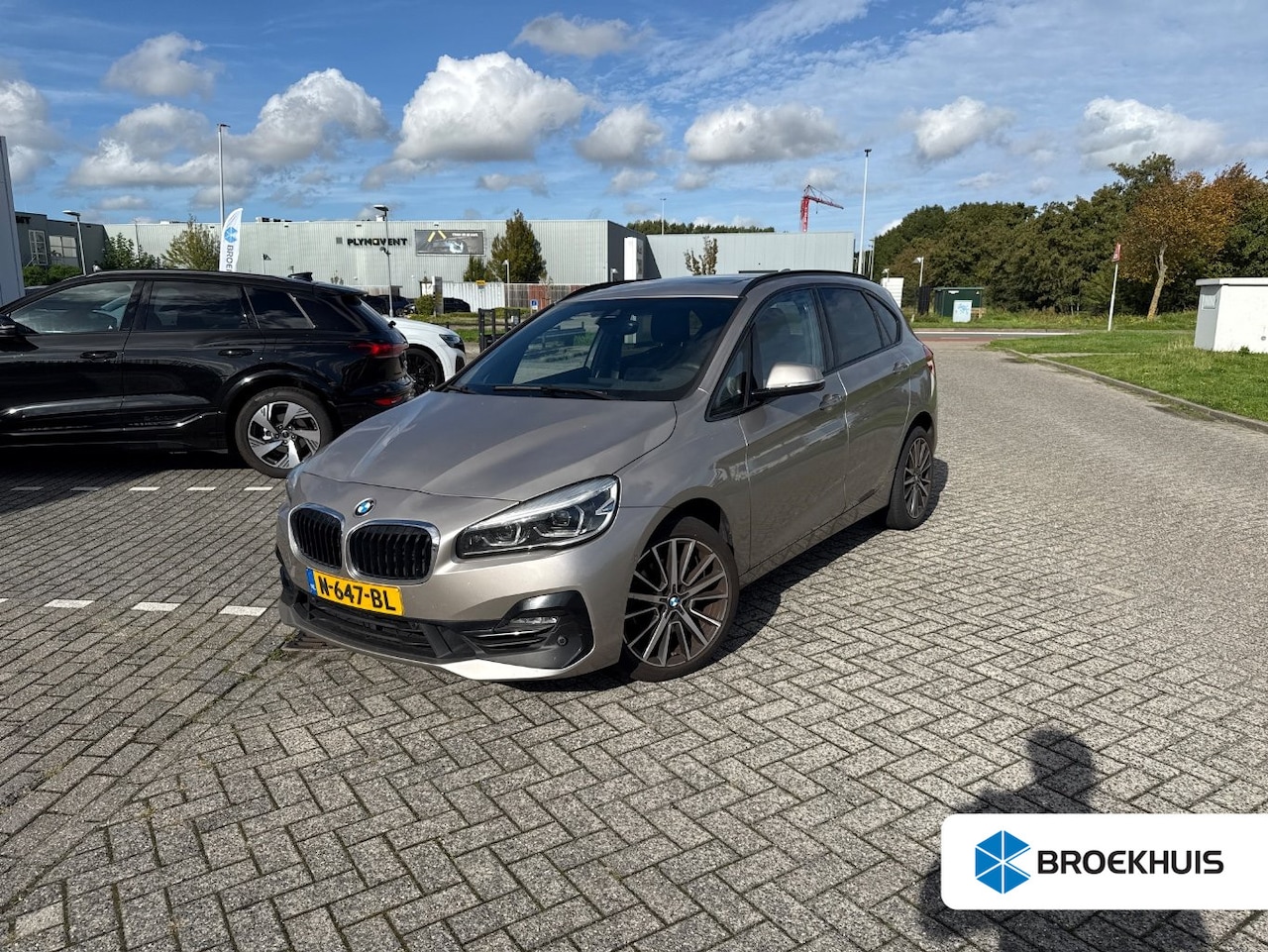 BMW 2-serie Active Tourer - 220i Business Edition Plus l Leder l Panoramadak l Stoelverwarming l Camera l Head up l El - AutoWereld.nl