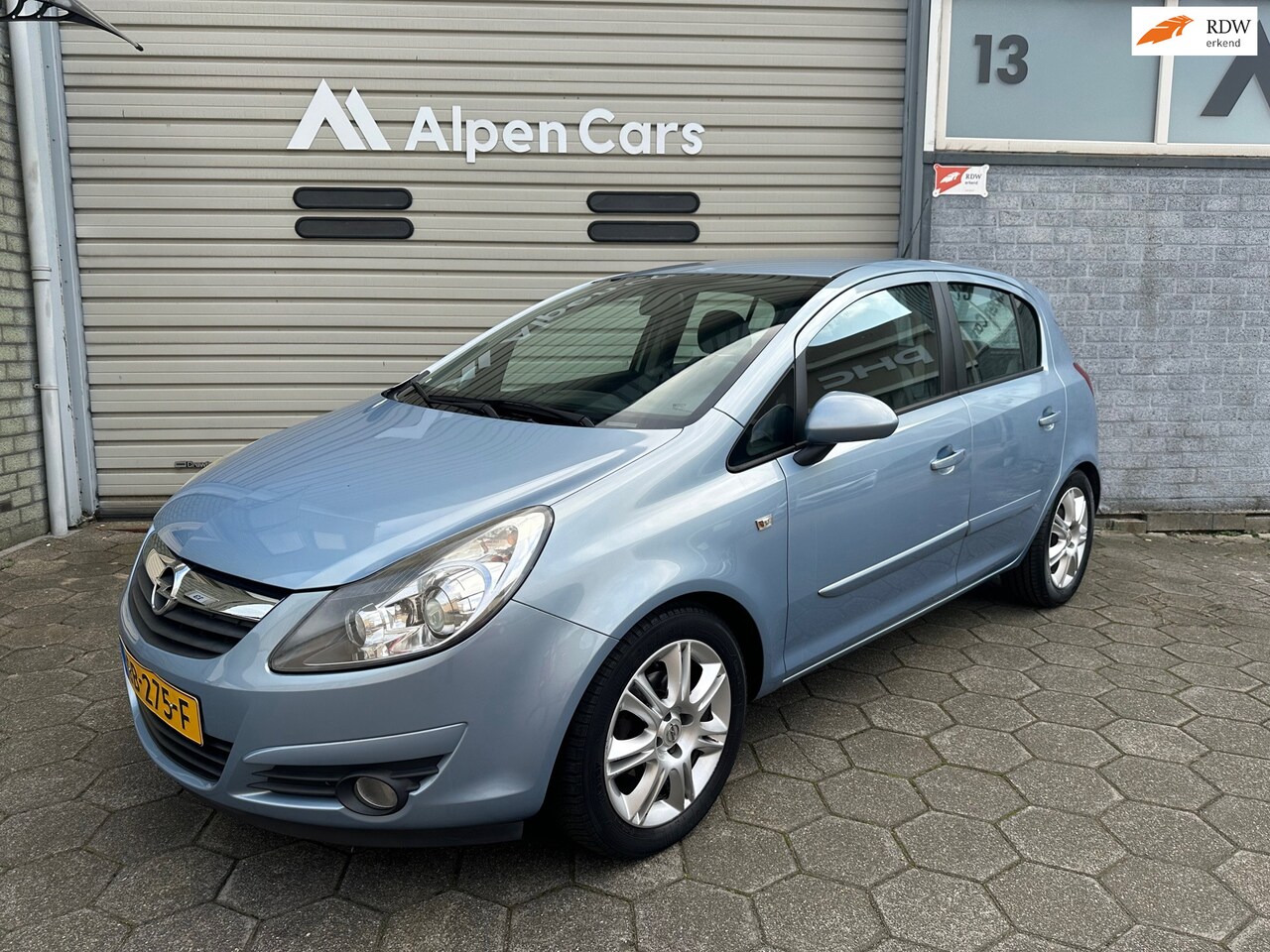 Opel Corsa - 1.0-12V Edition Eerste eigenaar / Cruise controle / AC / PDC / Trekhaak - AutoWereld.nl
