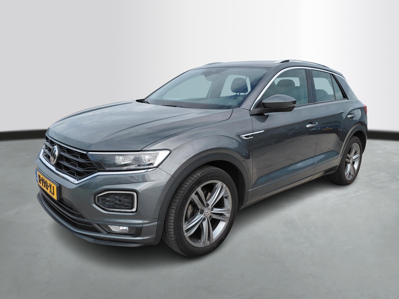 Volkswagen T-Roc - 1.5 TSI Automaat | Sport Business R | Verwarmde stoelen | Active Info Display | - AutoWereld.nl