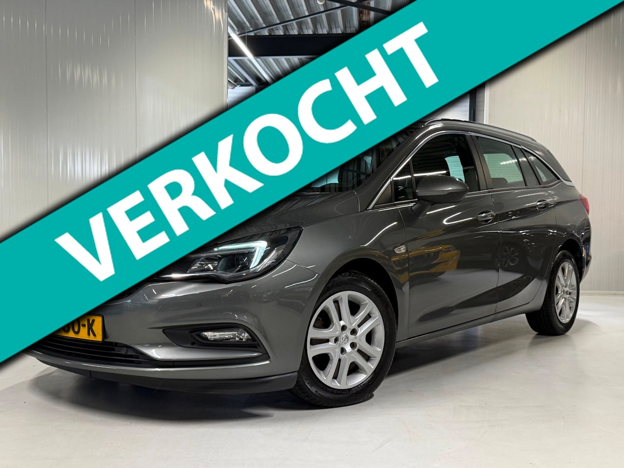 Opel Astra Sports Tourer - 1.6 CDTI 110PK Business+ Navigatie|Trekhaak! - AutoWereld.nl