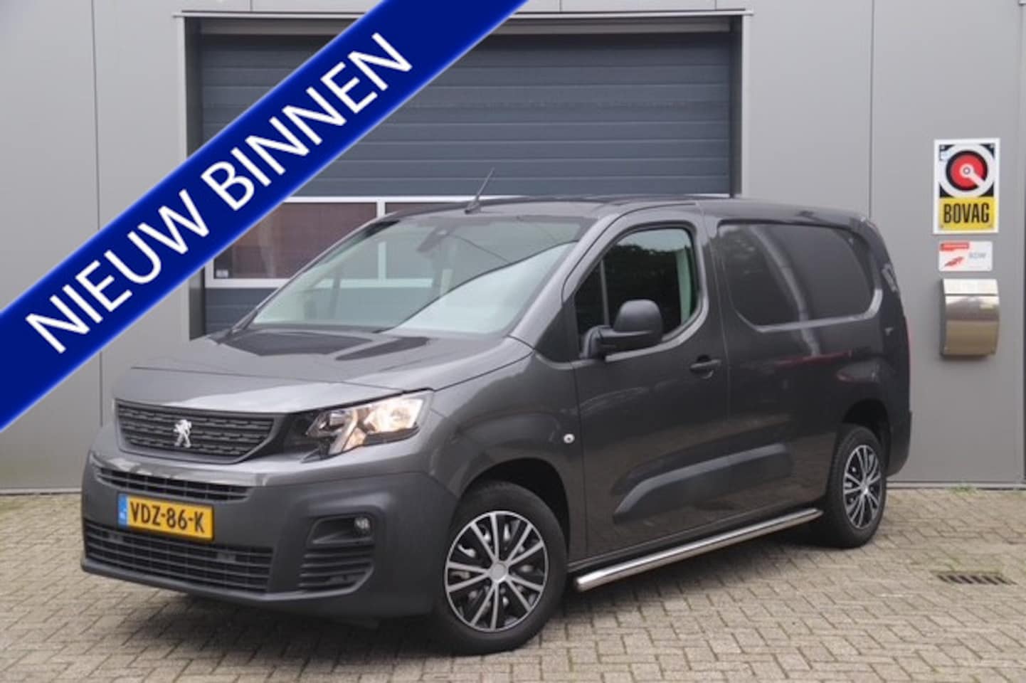 Peugeot Partner - 1.5 BlueHDI Asphalt Long L2, Trekhaak, Camera, Carplay, Cruise, Airco - AutoWereld.nl