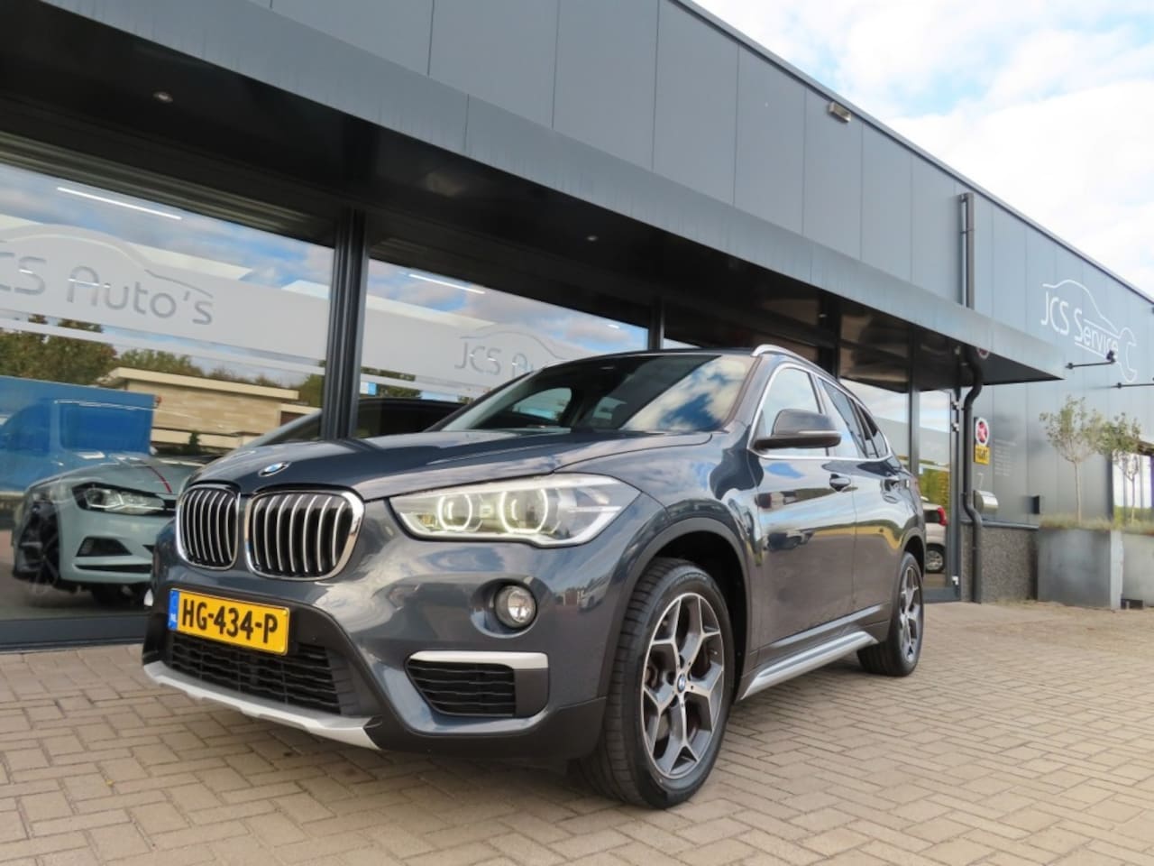 BMW X1 - sDrive20i Sport Ecc Leder Pano Trekhaak 2015 - AutoWereld.nl
