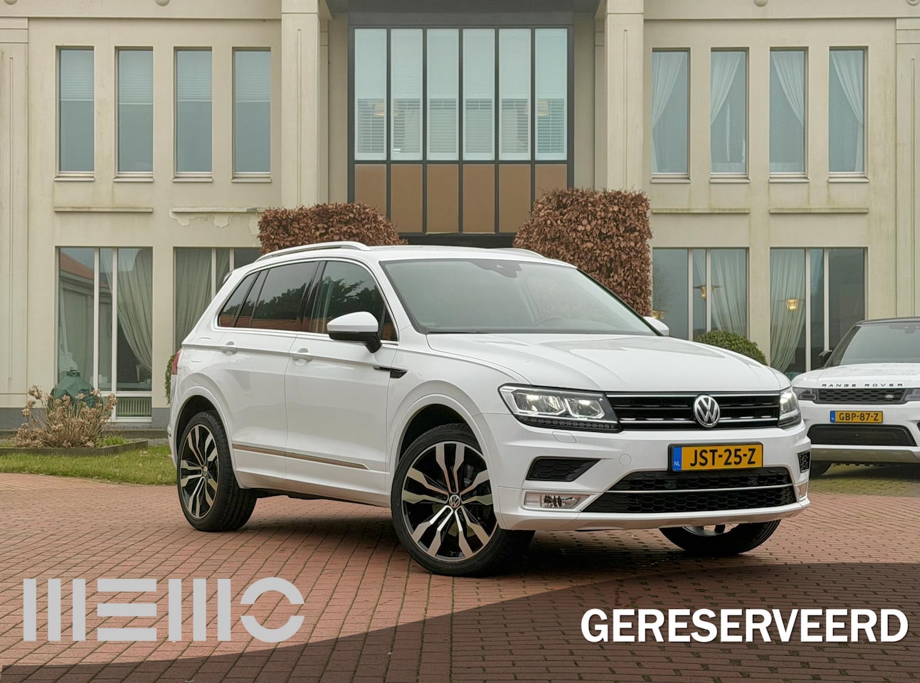 Volkswagen Tiguan - 2.0 TSI 4Motion Highline 2.0 TSI 4Motion Highline - AutoWereld.nl