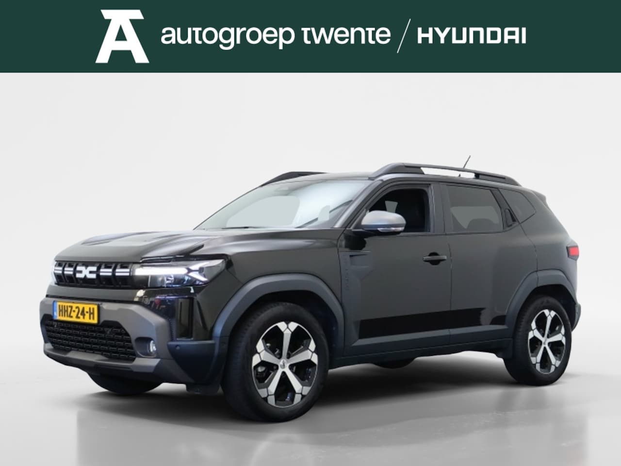 Dacia Duster - 1.6 Hybrid 140 Journey | Trekhaak | Navigatie | Camera - AutoWereld.nl