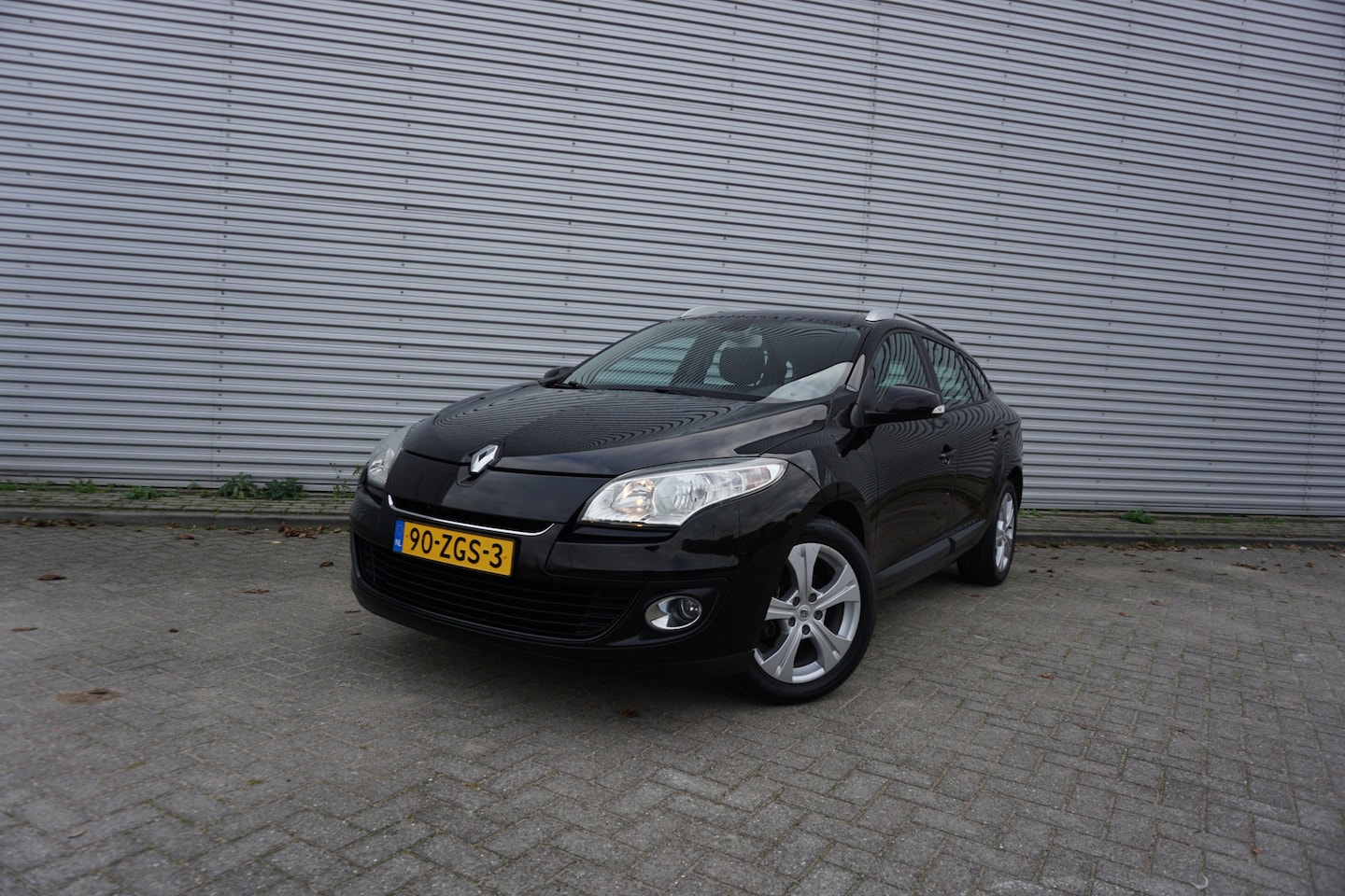 Renault Mégane Estate - 1.5 dCi Expression Airco / Navi / Cruise / Elektr. ramen / Parkeers. / Trekhaak / Lm velge - AutoWereld.nl