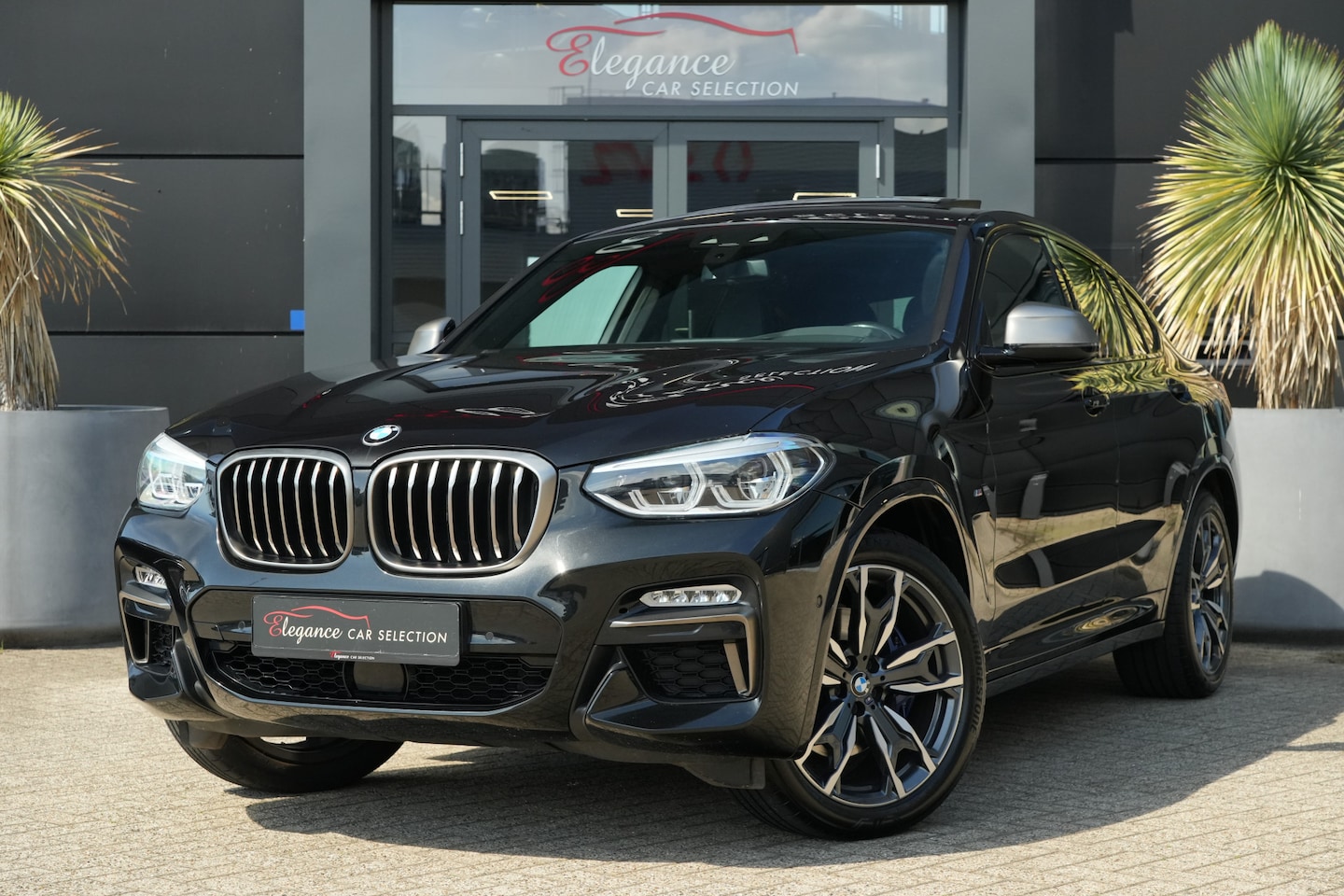 BMW X4 - M40i High Executive 354pk Panoramadak/Stoelverwarming/Trekhaak - AutoWereld.nl